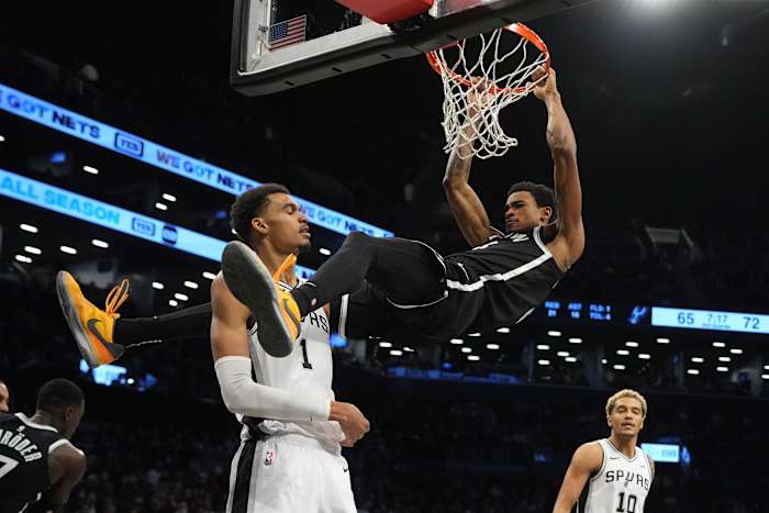 Brooklyn Nets center Nic Claxton (33) dunks the ball against San Antonio Spurs center Victor Wembanyama (1) 